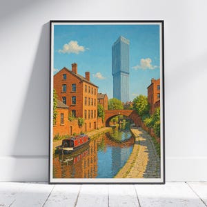 May include: Framed art print of a canal scene with brick buildings, a red and black boat, and a tall modern skyscraper in the background. The artwork features a bridge, trees, and a blue sky with clouds. The water reflects the buildings and sky.