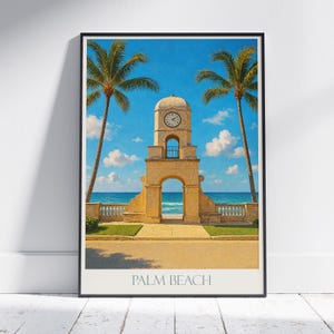 Puede incluir: Impresión enmarcada que presenta una torre del reloj con una entrada arqueada, sobre un fondo de cielo azul y océano. Dos palmeras enmarcan la torre. El texto "PALM BEACH" está impreso en la parte inferior.