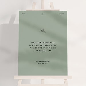 Puede incluir: Un cartel verde con el texto "YOUR TEXT HERE! THIS IS A CUSTOM LARGE SIGN, PLEASE USE IT HOWEVER YOU WOULD LIKE." y "THIS IS A CUSTOMIZABLE SIGN TEMPLATE". El cartel está en un caballete.