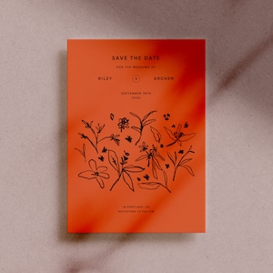 Puede incluir: Tarjeta naranja de guardar la fecha con texto negro e ilustraciones florales. El texto dice "Save the Date for the Wedding of Riley & Archer September 18th, 2026 In Portland, OR Invitation to Follow."