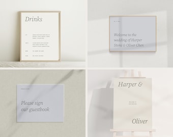 May include: Four wedding signs with a minimalist design. The signs are framed in wood and have a light blue background. The text on the signs reads: "Drinks", "Welcome to the wedding of Harper Stone & Oliver Chen", "Please sign our guestbook", and "Harper & Oliver".