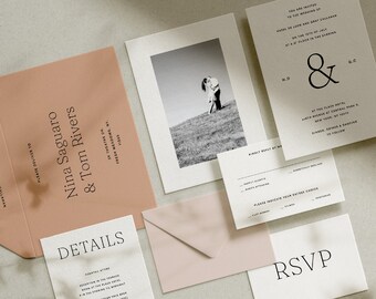 May include: A wedding invitation suite with a blush pink envelope, a white card with the couple's names and details, a black and white photo of the couple, and a white RSVP card.