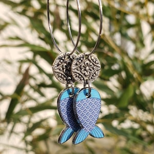 Blue and silver fish hoop earrings