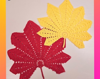 May include: Two crocheted maple leaf placemats, one red and one yellow, on a white background. The text "@crochetwithsumi" is in the top left corner of the image.