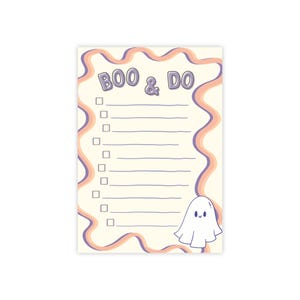 May include: A rectangular notepad with a cream background, featuring a wavy orange and purple border. The text BOO & DO is printed at the top in purple. Below are ten horizontal lines with square checkboxes and a small white ghost in the corner.