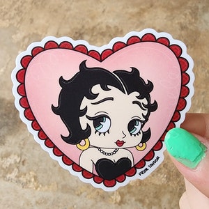 Betty boop vinyl sticker, laced heart, vintage cartoons, retro, kawaii, blowing kiss, rubberhose, aesthetic, pink, animation