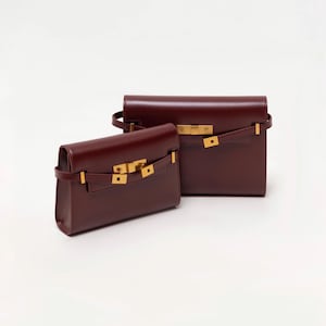 Handmade leather shoulder bag in brown with a relaxed shape for everyday use