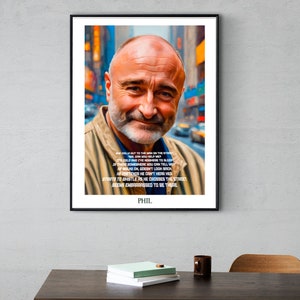 Può includere: Un poster incorniciato in bianco e nero con una foto di un uomo con la barba e uno sfondo di città. Il testo sul poster recita: "You really wait for the man with the guitar, it's cold and I've nowhere to go.  I'd always play for him whenever he played, of the silence where he couldn't tell you, that somewhere we didn't look back.  Just to whistle for me crossed the street,  seeing embarrassed to be there. PHIL."