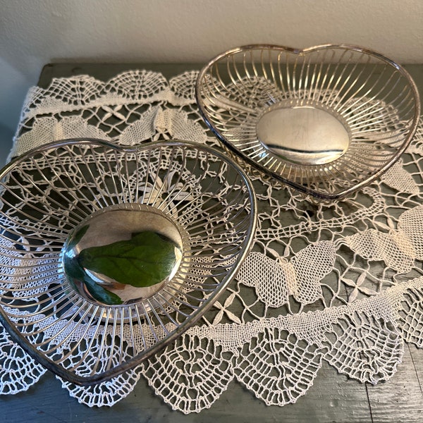 Pair of vintage heart shaped silver plated baskets