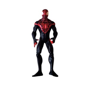 May include: Black and red action figure of Spider-Man with a black suit and red spider design on the chest.