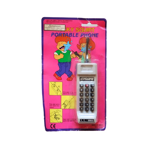 Sealed 1990s Squirt Cell Phone Toy (first generation cell, mini cell phone, retro cell phone, vintage cell phone prank toy, classic toy)