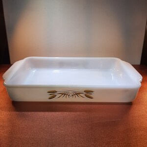 May include: White rectangular baking dish with a brown wheat design.