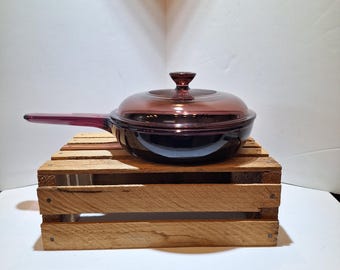 Vintage 1980s -- Visions -- Corning -- Cranberry -- 7 inch skillet with non-stick bottom -- U.S.A. -- Pyrex V-1.5-C Cranberry Lid