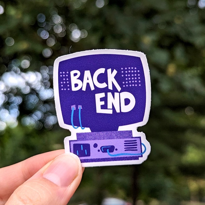 May include: Purple and blue computer monitor sticker with the text "BACK END" on it. The sticker is shaped like a computer monitor with a small speaker on the bottom.
