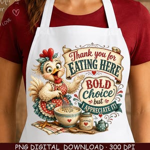 May include: A white apron featuring a cartoon chicken wearing a red polka dot apron and a blue headband, holding a whisk over a mixing bowl. The text reads: Thank you for EATING HERE BOLD choice but I APPRECIATE IT! with a small jar and teapot.
