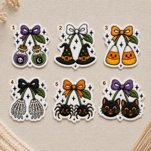 May include: Six embroidered patches featuring pairs of Halloween-themed icons: potion bottles, witch hats, candy corn, skeleton hands, spiders, and black cats. Each pair is topped with a decorative bow and green leaves, accented by small star shapes.