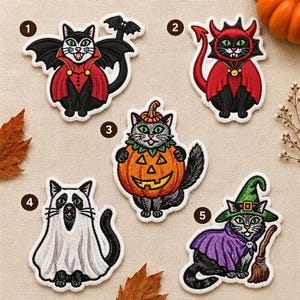 May include: Five embroidered patches featuring cats in Halloween costumes: a vampire cat with black wings, a red devil cat, a cat inside a jack-o'-lantern, a cat wearing a white ghost sheet, and a cat in a purple cloak with a green witch hat.