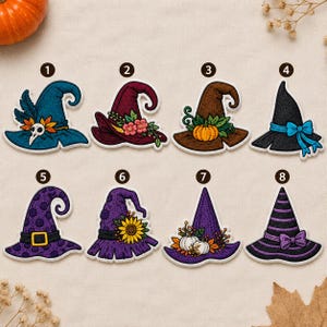 May include: Eight embroidered witch hat patches arranged in two rows, numbered one through eight. Designs include various colors like teal, burgundy, brown, black, and purple, featuring decorative elements such as skulls, flowers, pumpkins, and bows.