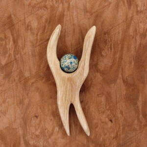 Ash wood angel with a howlite bead