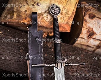 May include: A silver sword with a black handle and a leather scabbard. The sword has a decorative design on the pommel and a twisted blade.