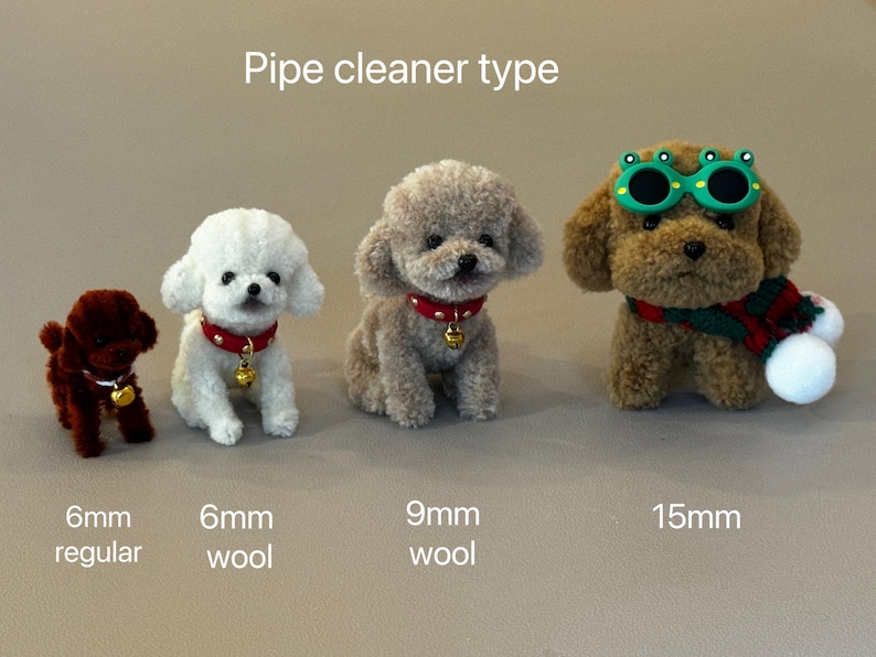 May include: Four pipe cleaner poodle dogs in different sizes. The smallest is 6mm regular pipe cleaner, the next is 6mm wool pipe cleaner, the next is 9mm wool pipe cleaner, and the largest is 15mm pipe cleaner.  The largest poodle is wearing green sunglasses and a red and green scarf.