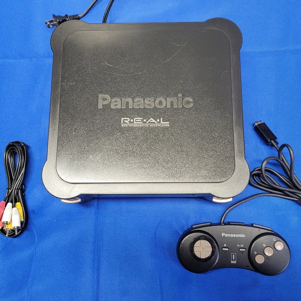 La consola Panasonic 3DO con 1 controlador y cables AV funciona y luce excelente. Nueva OEM que ahorra batería. Región de EE.UU./Canadá