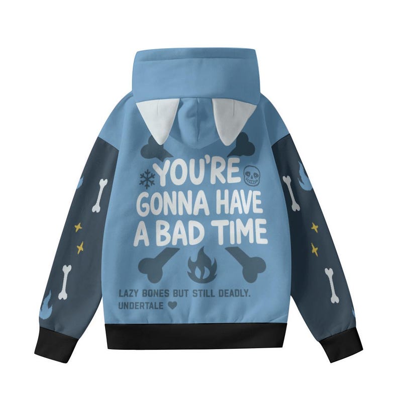 May include: A light blue hoodie with a high collar and a hood featuring white accents. The back displays the text "YOU'RE GONNA HAVE A BAD TIME" with bone and skull graphics. The sleeves have bone and star patterns.