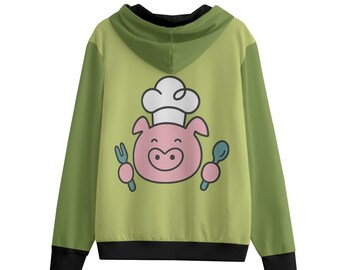 Può includere: Una felpa con cappuccio verde con orlo e maniche neri. Il retro presenta un maiale dei cartoni animati con un cappello da chef, che tiene una forchetta e un cucchiaio. Il cappuccio è di una tonalità di verde più scura.