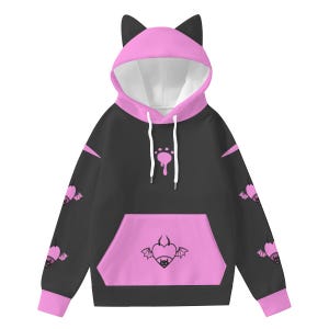 May include: Black hoodie with a pink cat ear hood, pink accents, and a front pocket. The hoodie features a paw print design and bat-winged heart graphics. The sleeves have bat-winged heart designs. The hoodie is made of a soft material.