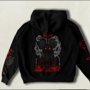 Festive Halloween Gothic hoodie featuring spooky elements like pumpkins, ghosts, bats, and a haunted house design, perfect for celebrating the spooky season in style.