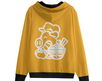 Può includere: Felpa con cappuccio giallo senape con finiture e fodera del cappuccio nere. Il retro presenta una grafica bianca di un maiale con cappello da chef, che tiene una ciotola di ramen con le bacchette. La felpa ha maniche lunghe e una cerniera integrale.