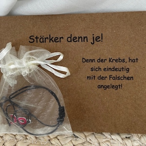 Armband mit Brustkrebsschleife plus Mutmacherkarte