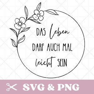 May include: Black and white line art illustration of a floral wreath with the text "Das Leben darf auch mal leicht sein" inside the wreath.
