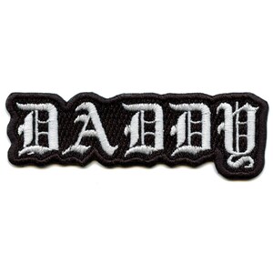 May include: White embroidered "DADDY" text on a black patch.