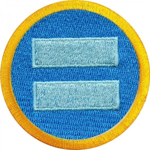 May include: A blue and yellow embroidered patch featuring an equality symbol. The symbol is two horizontal lines, one above the other.