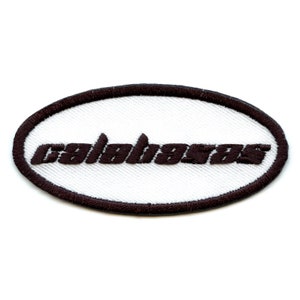 May include: White oval patch with a brown embroidered border and the word "calabasas" in brown lettering.