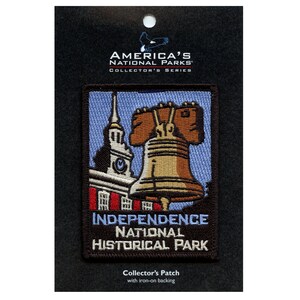 May include: An embroidered patch featuring the Liberty Bell and Independence Hall, with the text "America's National Parks Collector's Series" and "Independence National Historical Park".