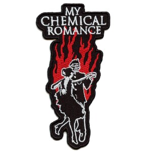 May include: Black and white embroidered patch with the text "My Chemical Romance" in white lettering. The patch features a silhouette of a couple dancing in front of red flames.