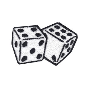 May include: Two white dice with black dots, one die is on top of the other. The dice are embroidered.