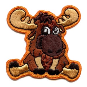 May include: Embroidered iron-on patch of a brown cartoon moose with large ears, sitting with its legs crossed. The patch has an orange outline.