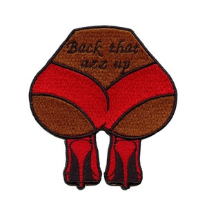May include: Brown and red embroidered patch with the text "Back that azz up" in black thread.