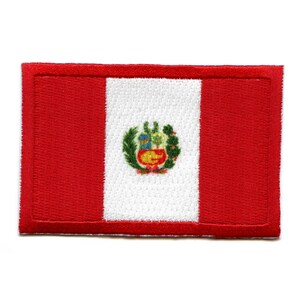 May include: A red, white, and red embroidered patch with the coat of arms of Peru in the center.