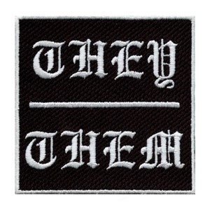 May include: Black and white embroidered patch with the words "THEY" and "THEM" in a gothic font.