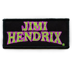 Puede incluir: Parche bordado negro con el texto "Jimi Hendrix" en letras verdes y moradas.