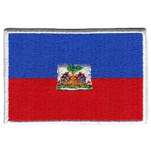 May include: Embroidered patch of the Haitian flag. The flag is blue and red with a coat of arms in the center. The coat of arms features a palm tree, a shield, and a banner.