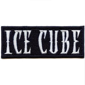 May include: White embroidered "ICE CUBE" text on a black rectangular patch.