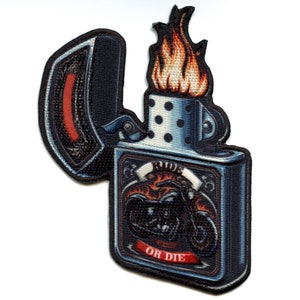 May include: A blue and silver lighter patch with a motorcycle and flames. The text on the patch reads "Ride or Die".