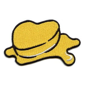 May include: A yellow embroidered iron-on patch shaped like a melting ice cream cone.