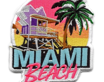 May include: An embroidered patch with a colorful sunset scene, a purple lifeguard stand, a palm tree, and the text "Miami Beach".