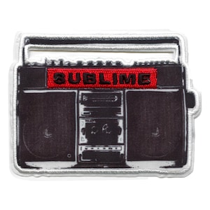 May include: A black and white image of a vintage boombox with the word "SUBLIME" in red letters across the top.